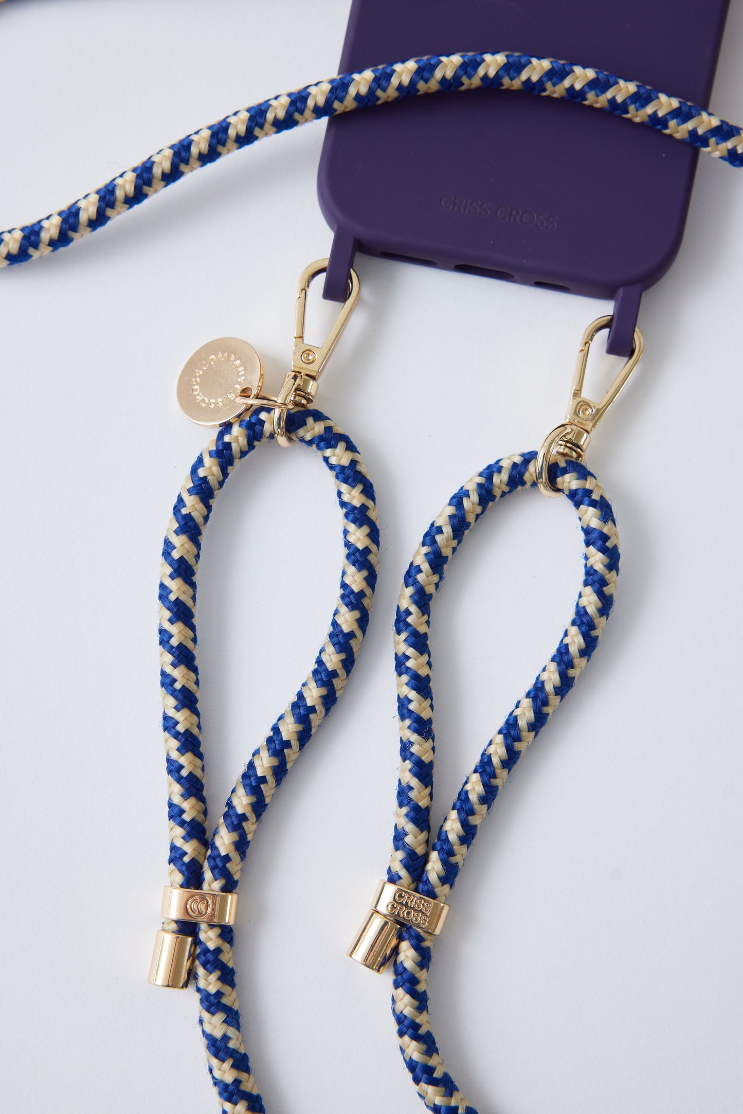 Colorful silicone case with hooks for IP 15 series, featuring MagSafe compatibility and attached blue and cream straps.