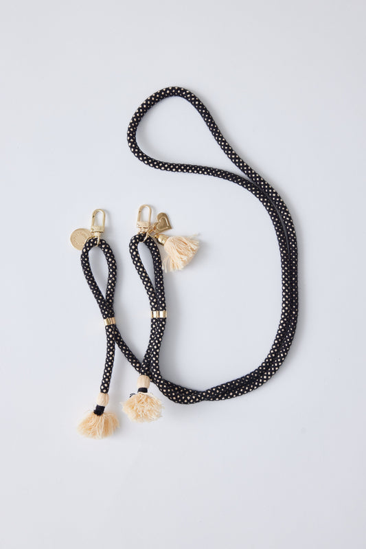 Detachable cotton phone strap with double carabiners, tassels, and heart charm.
