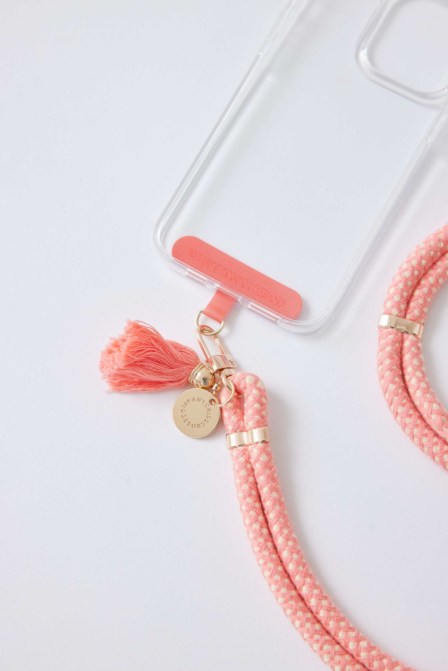 cotton phone strap with universal adapter attached to phone case