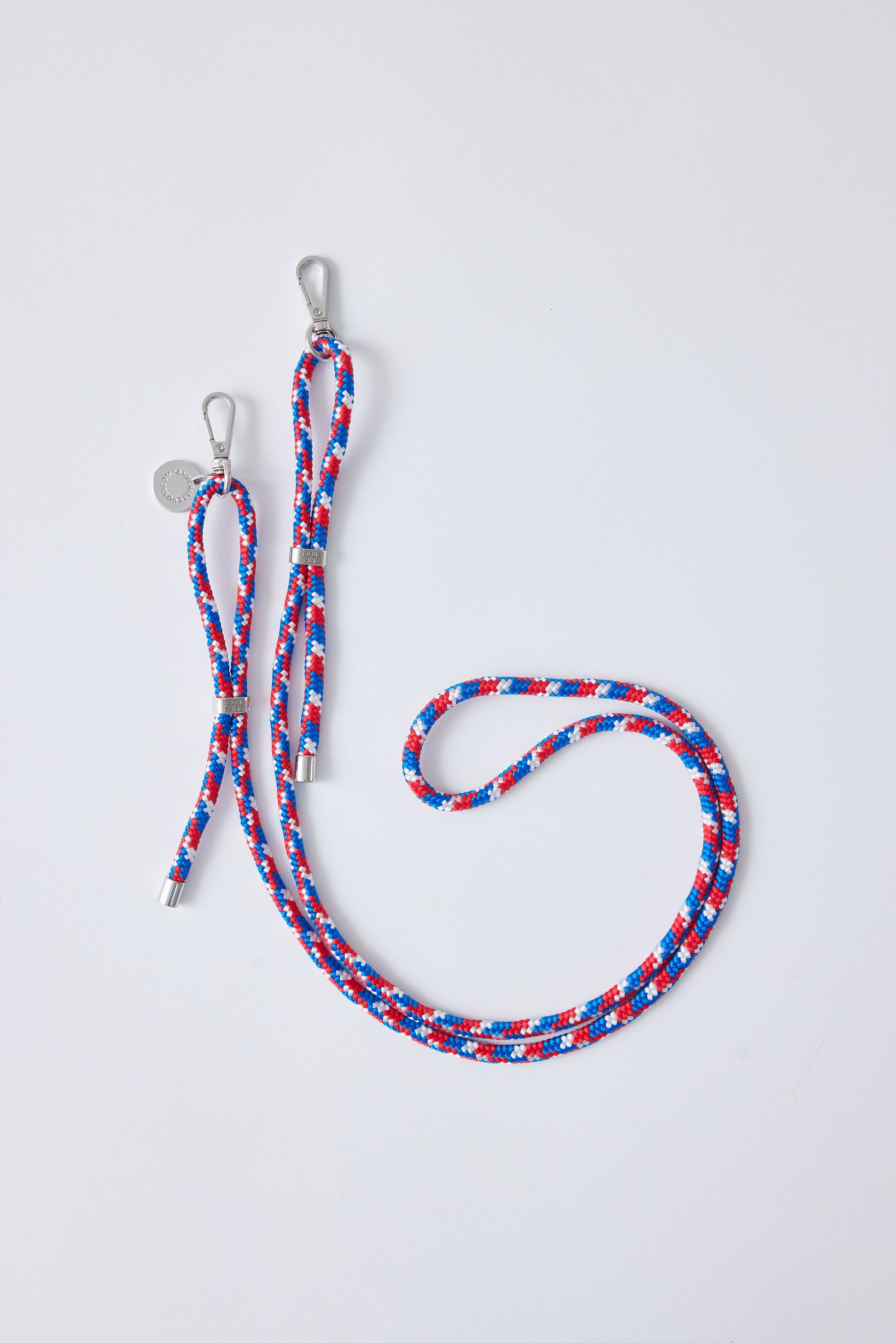 Detachable polyester straps with carabiners and USA colors.
