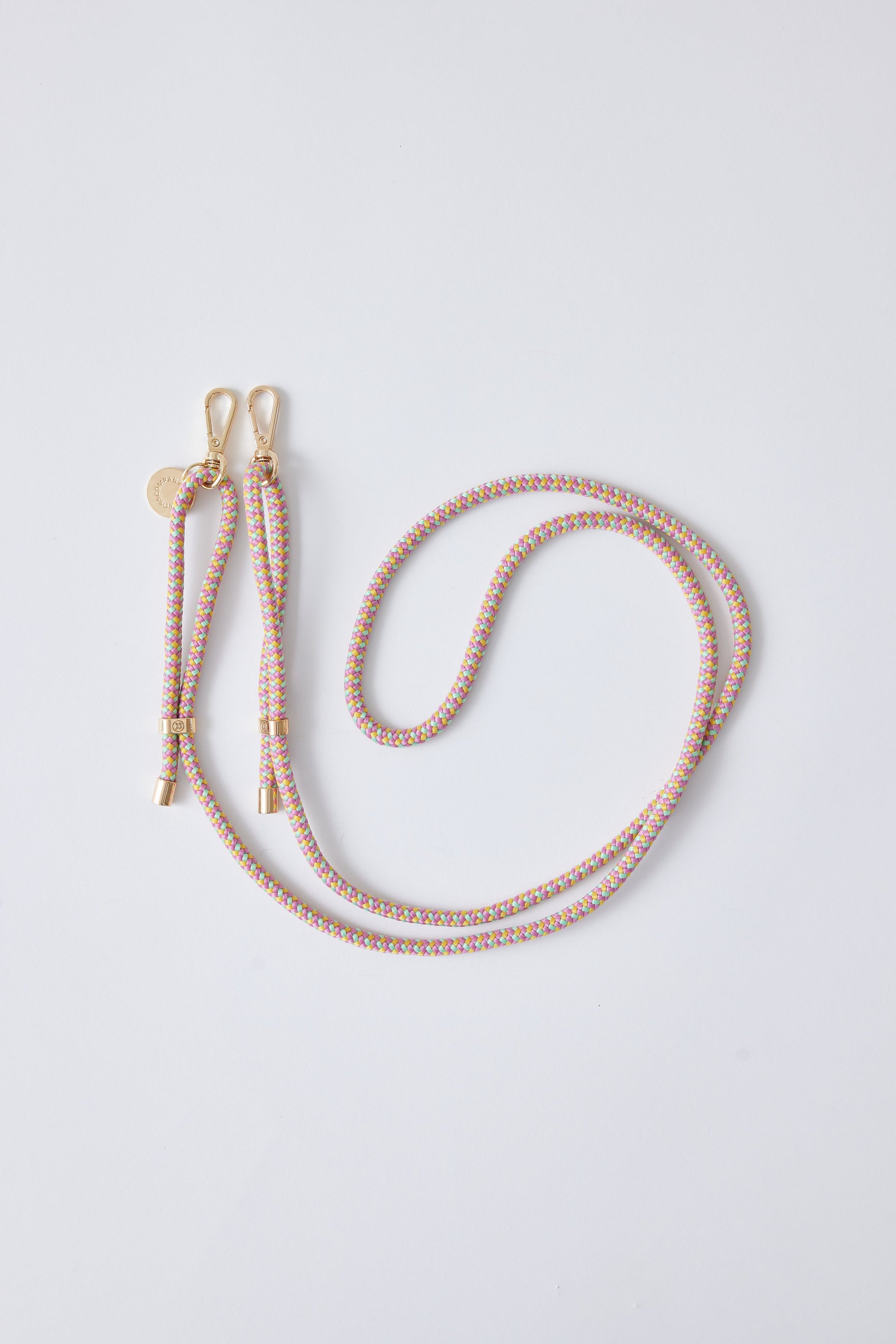 Detachable Poly Straps in pinks with gold carabiners, adjustable 60-inch polyester straps.