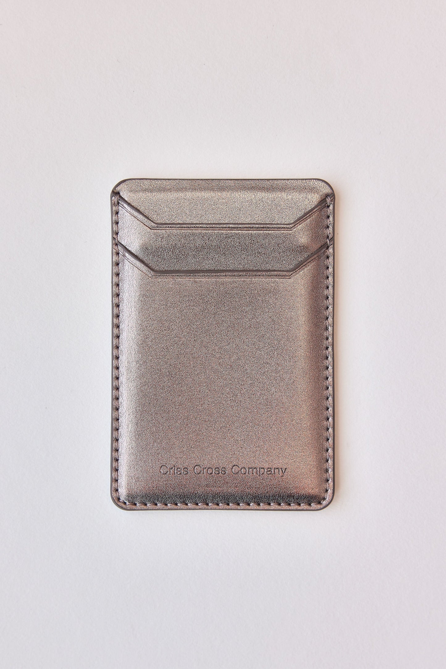 Sticky vegan leather phone wallet with two card slots.