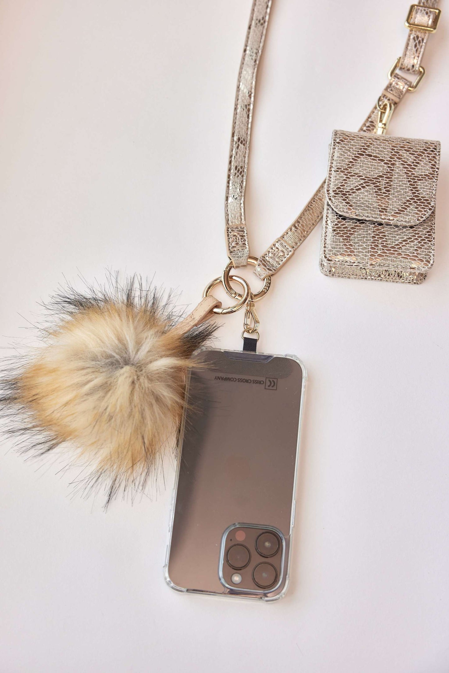 faux fur pom-poms accessory with phone and mini bag charm