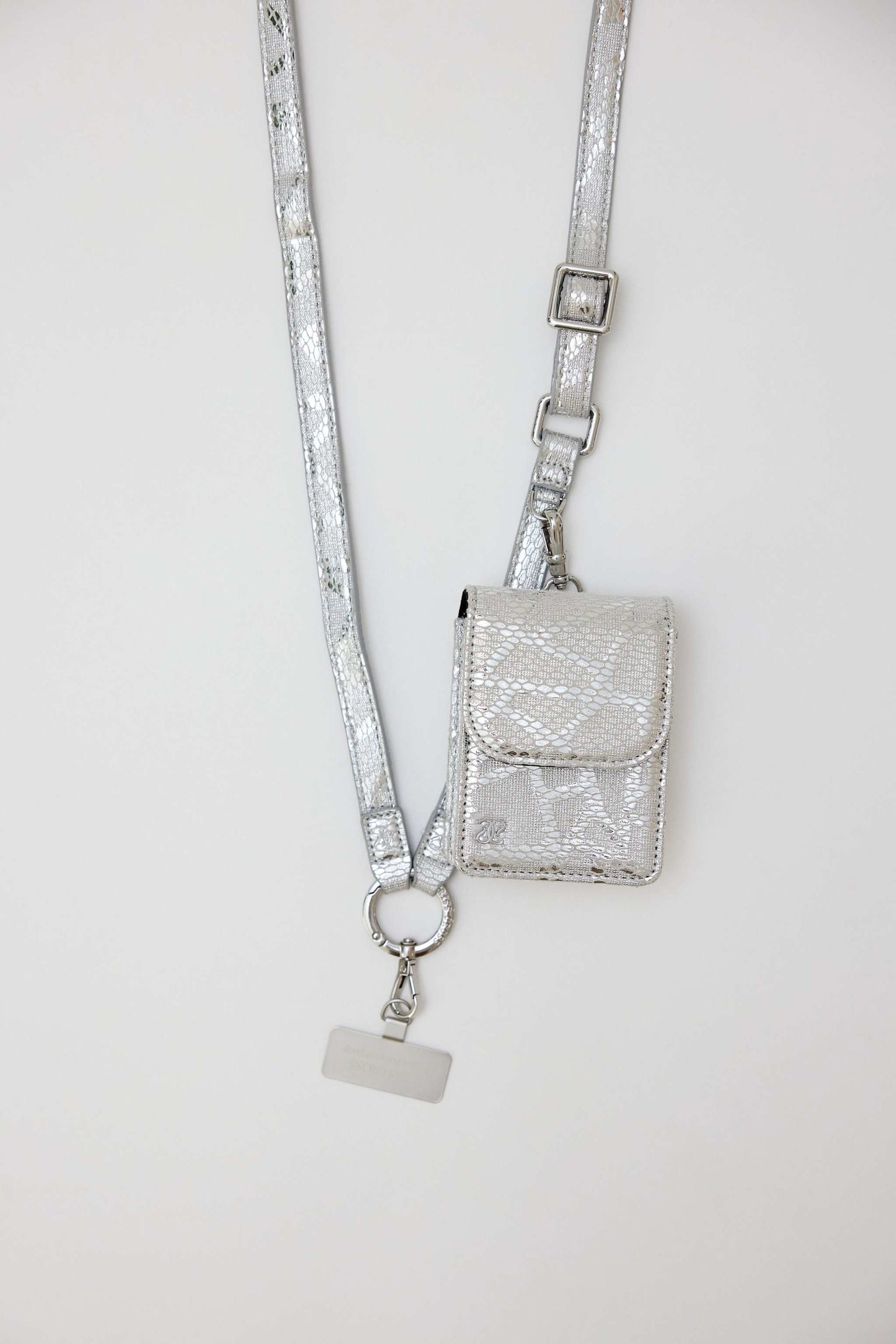 Cobra vegan leather strap with clip wallet and phone holder in silver.