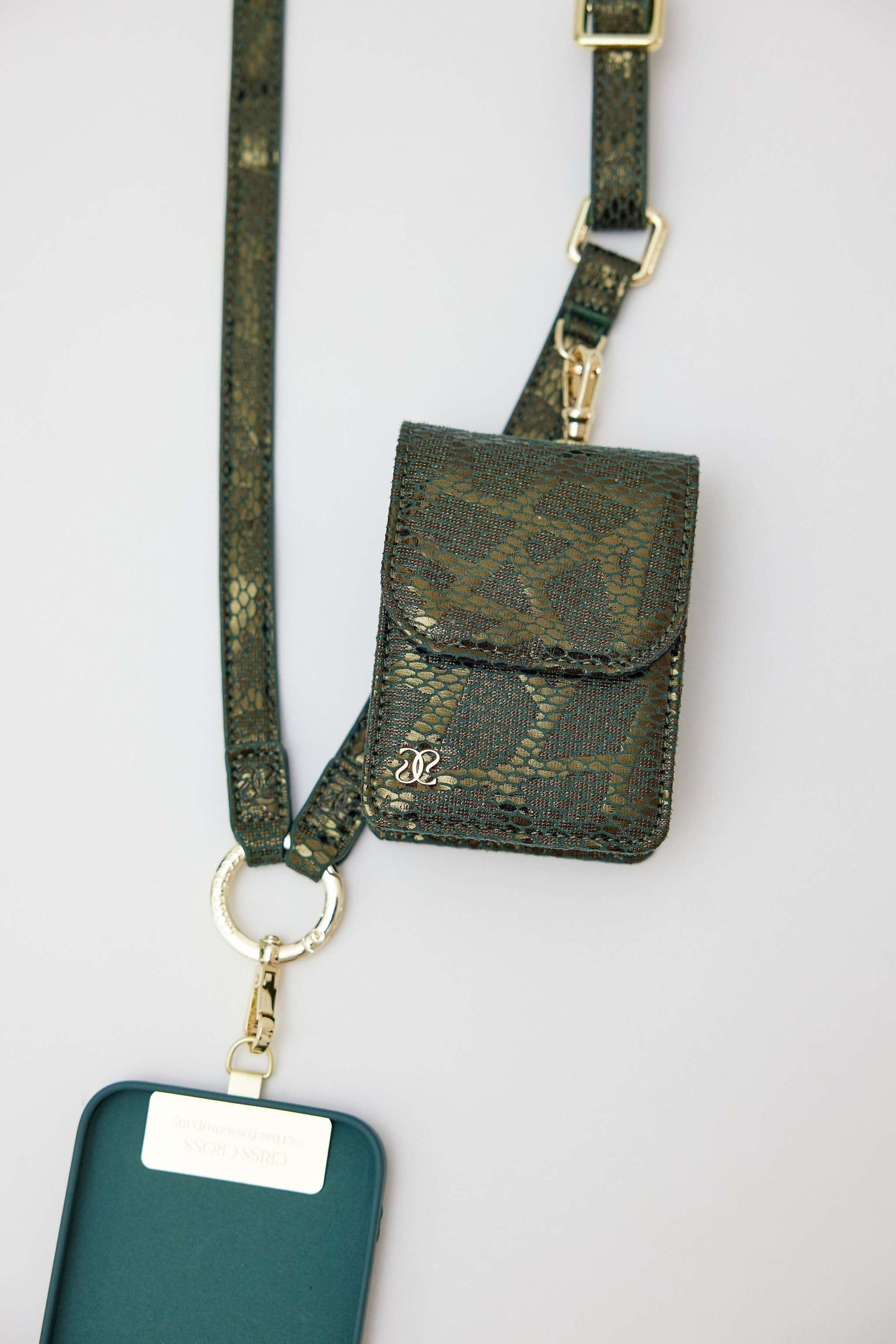 Cobra vegan leather strap with clip wallet and phone holder in chic snake pattern.