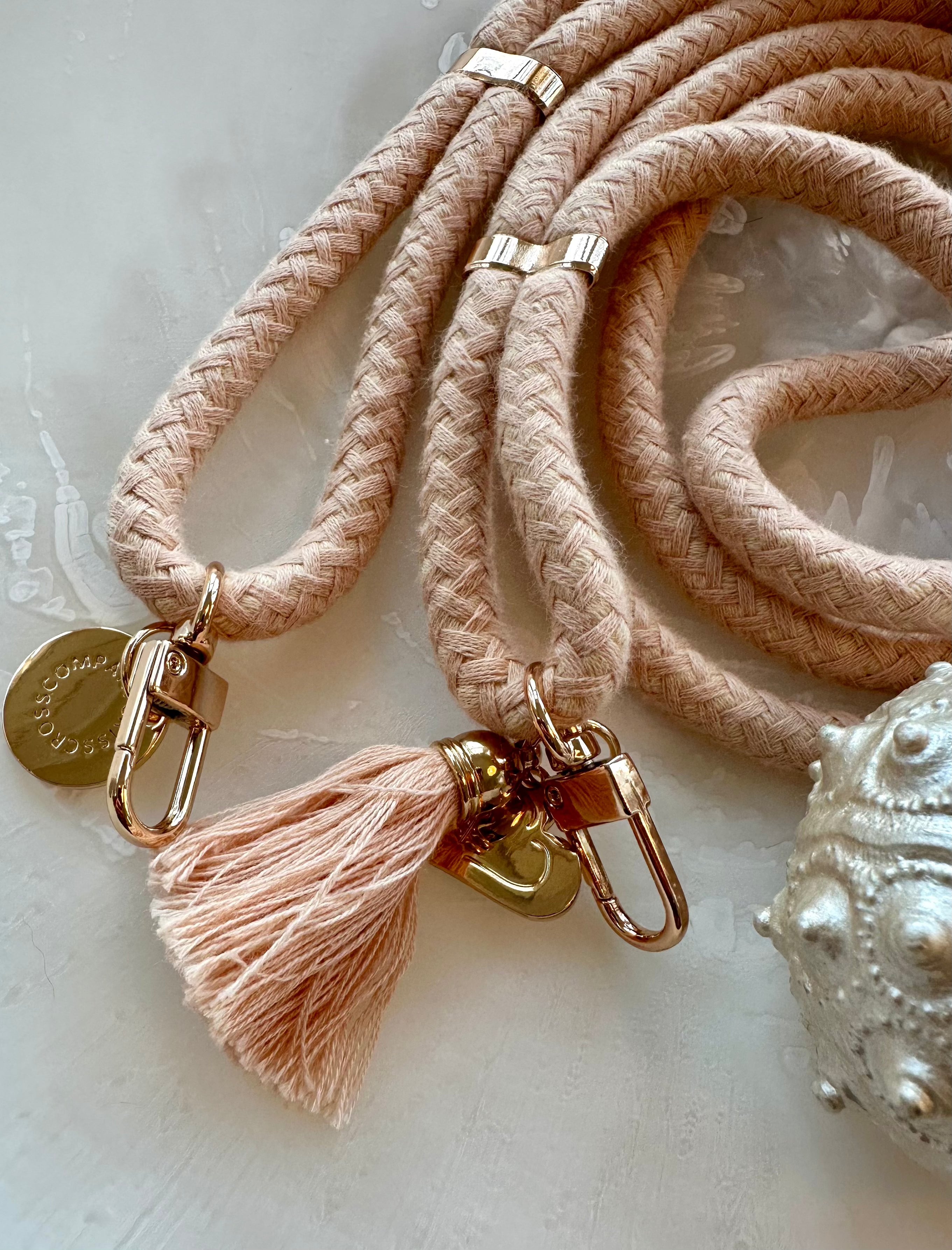 Detachable cotton phone straps with double carabiners, tassels, heart charm, gold hardware.