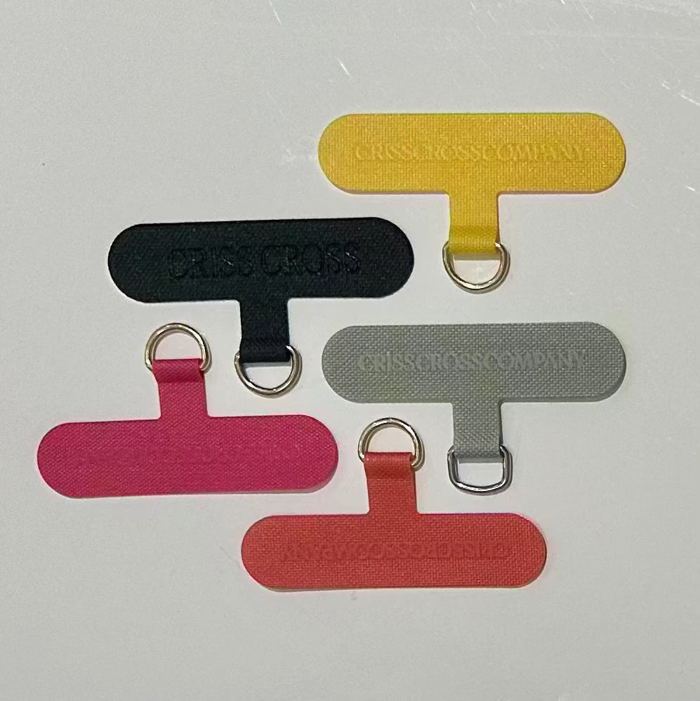 Colorful universal phone adapters for secure phone attachment.