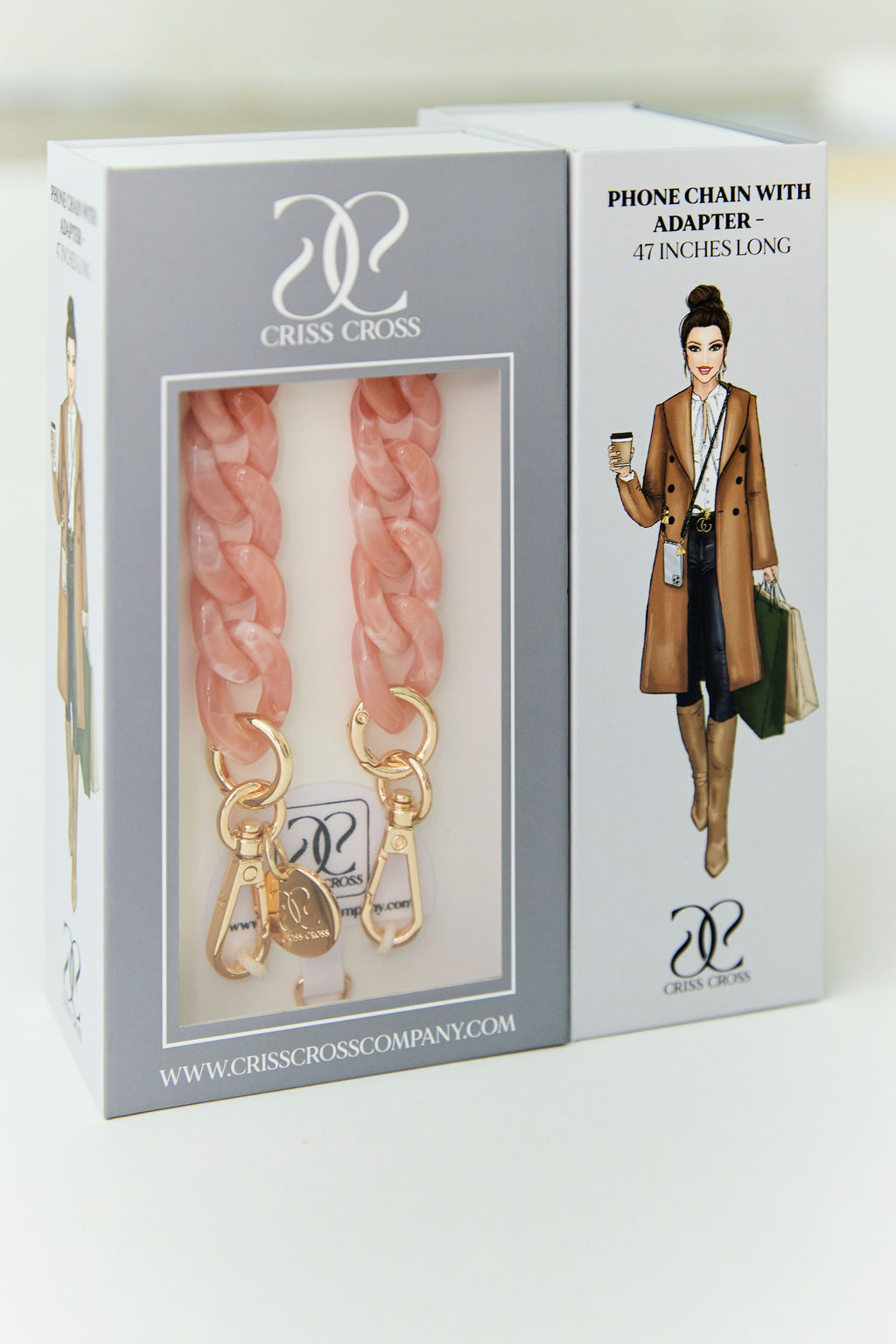Detachable acrylic phone chains with golden rings and carabiners in packaging.