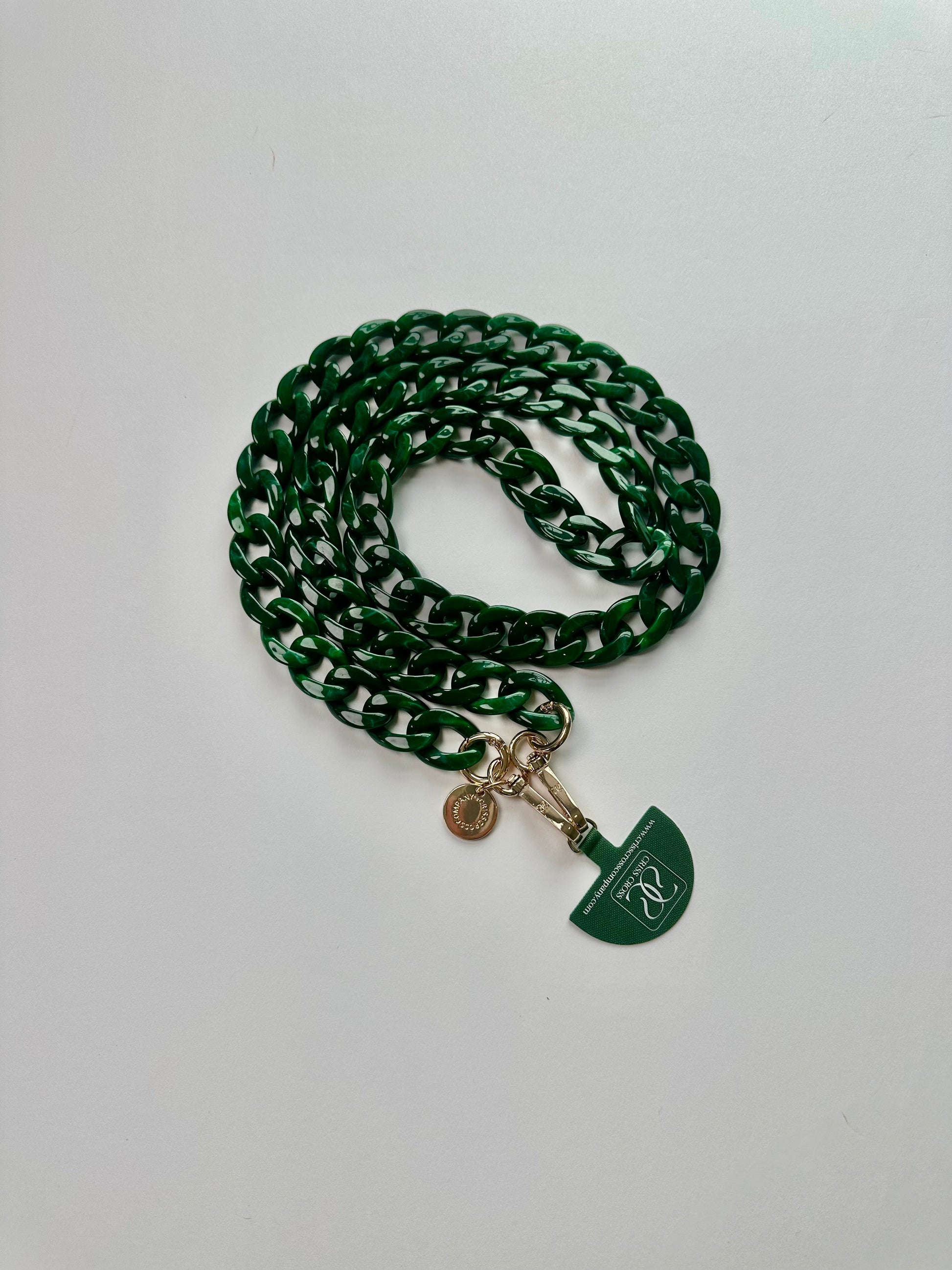 Glossy detachable acrylic phone chain with universal adapter and alloy carabiners attached to phone case