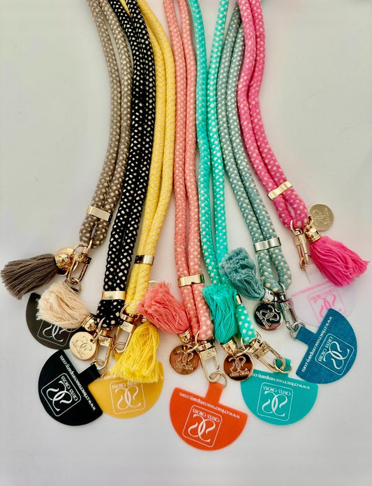 Adjustable cotton phone strap with universal adapter and tassels for hands-free carrying