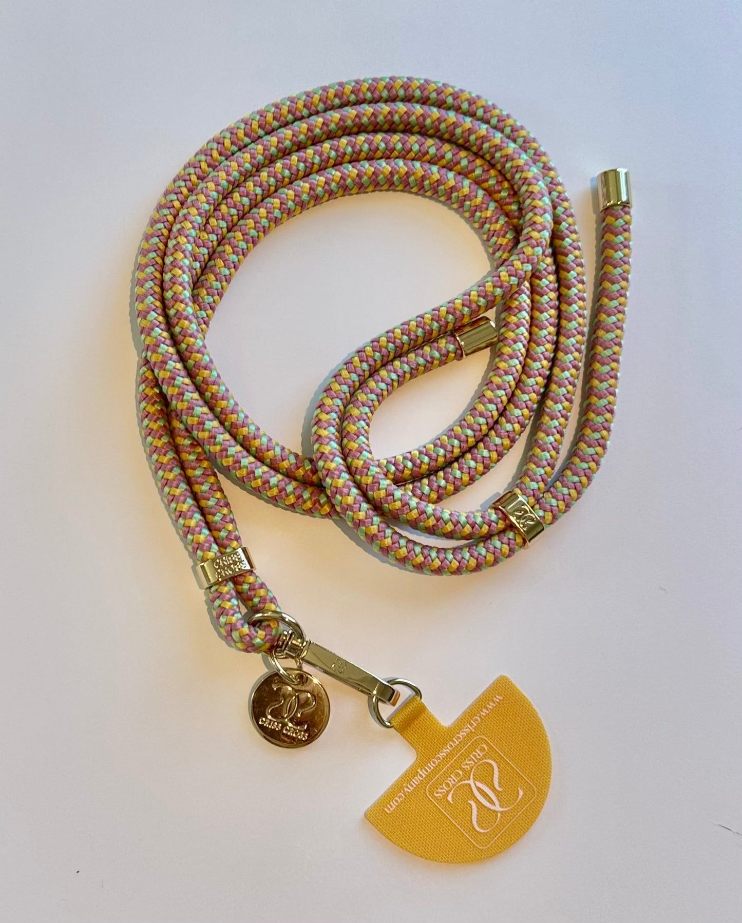 Pastel phone straps with adjustable woven material, single carabiner, and universal adapter for hands-free use