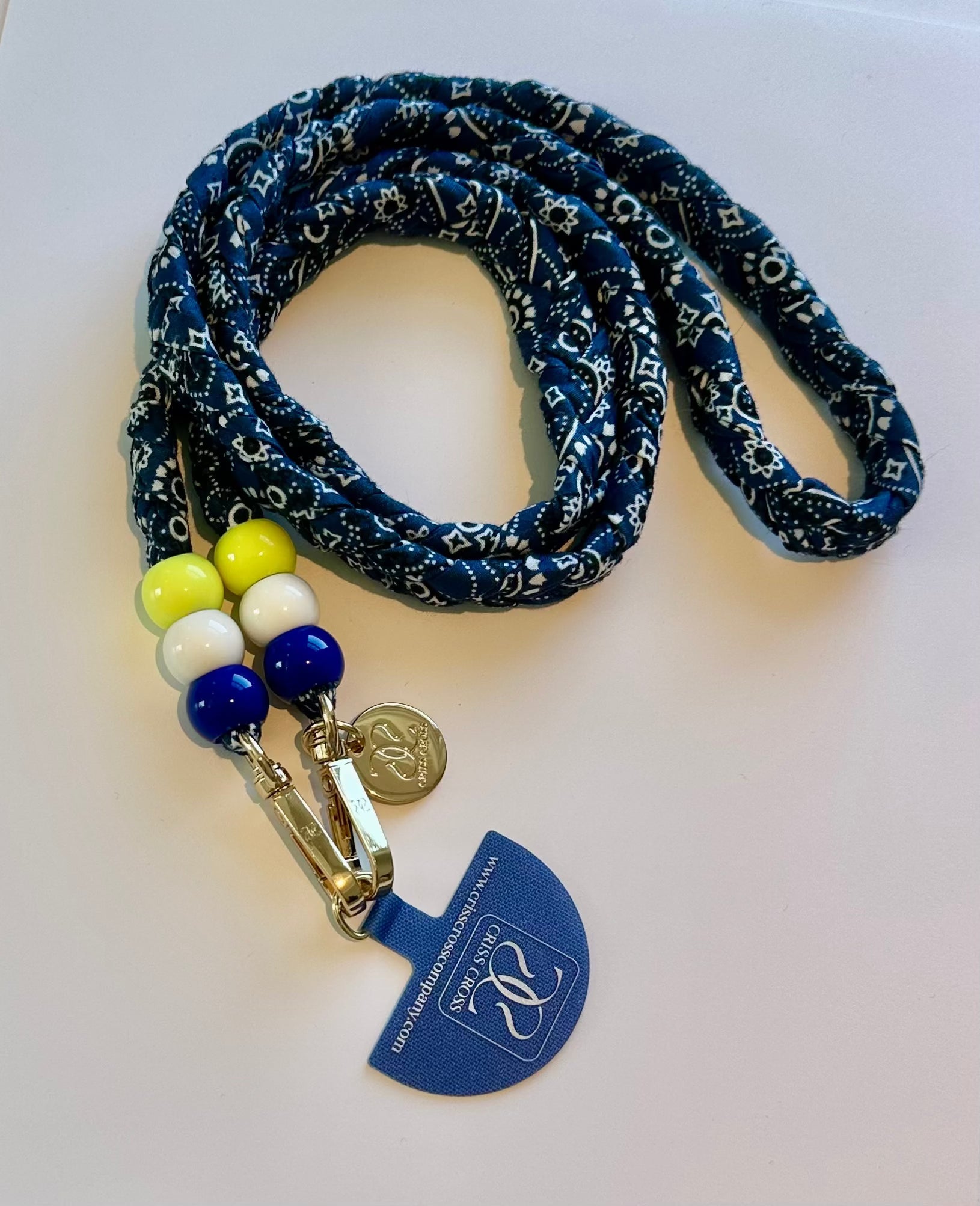 Bandana phone straps with universal adapter and bead details on a casual phone case