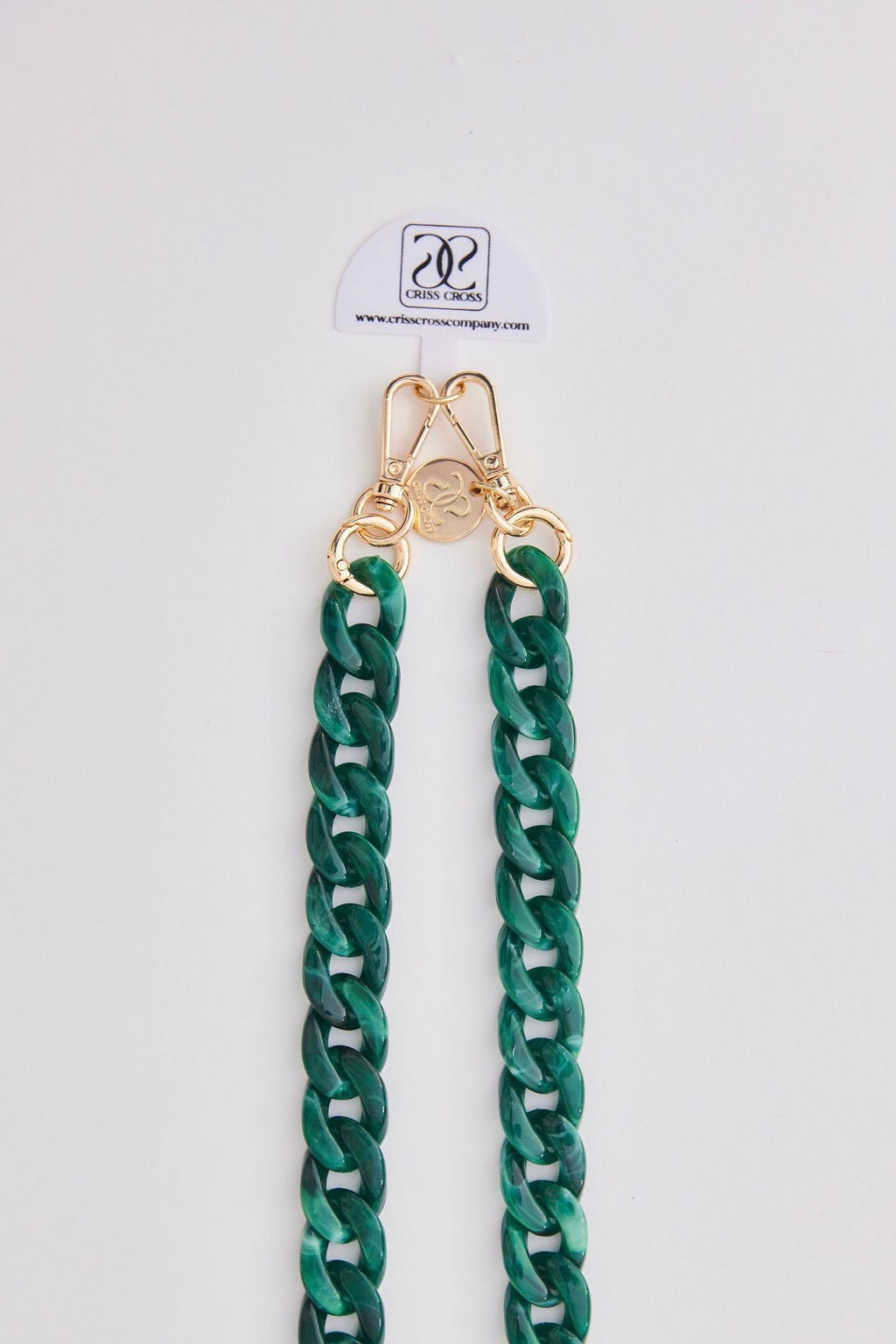 Detachable acrylic phone chain with green links and gold carabiners for versatile phone case attachment