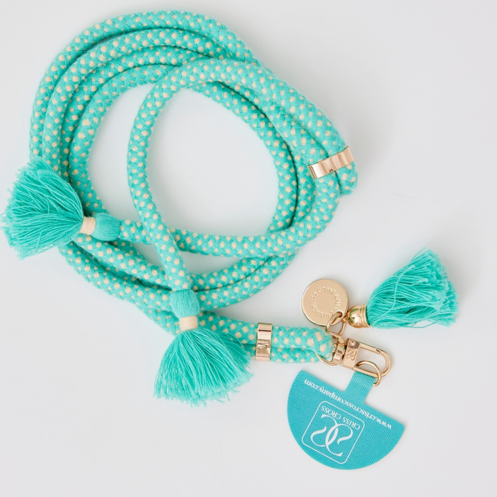 Adjustable cotton phone strap with universal adapter and decorative tassels for hands-free carrying